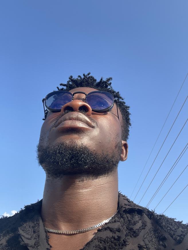Looking up at the sky in sunglasses
