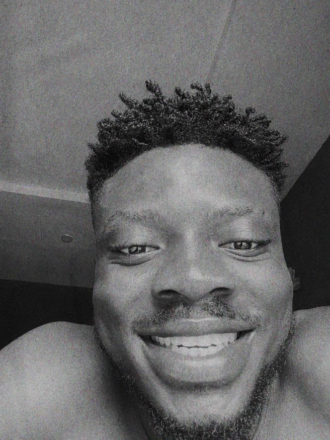 Grainy black and white smile